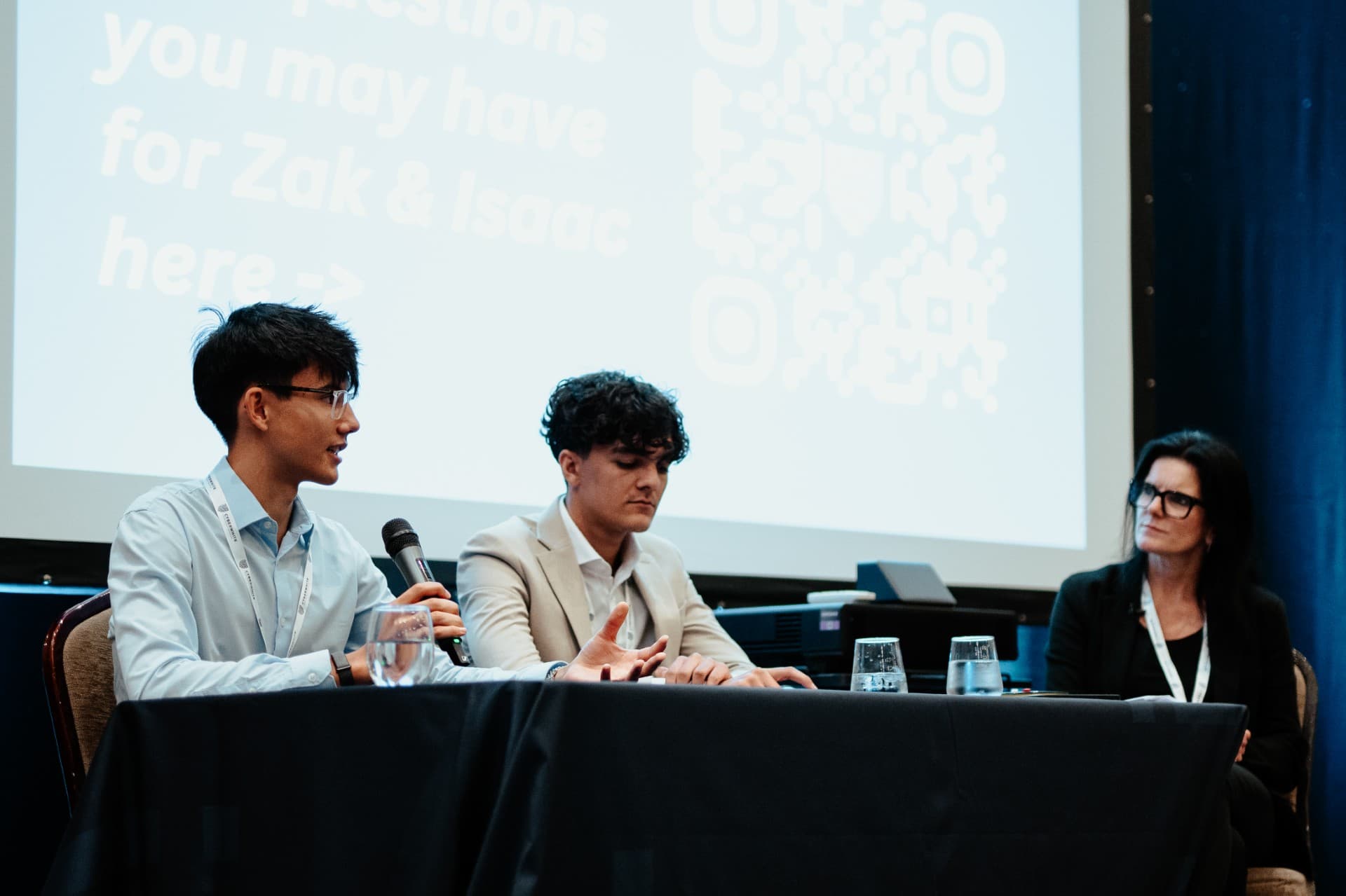 Isaac Kennington speaking on a panel at the CyberWhite CIA Conference in 2026